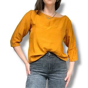 Yves Saint Laurent Vintage Yellow Blouse with Relaxed Fit and Rounded Neckline